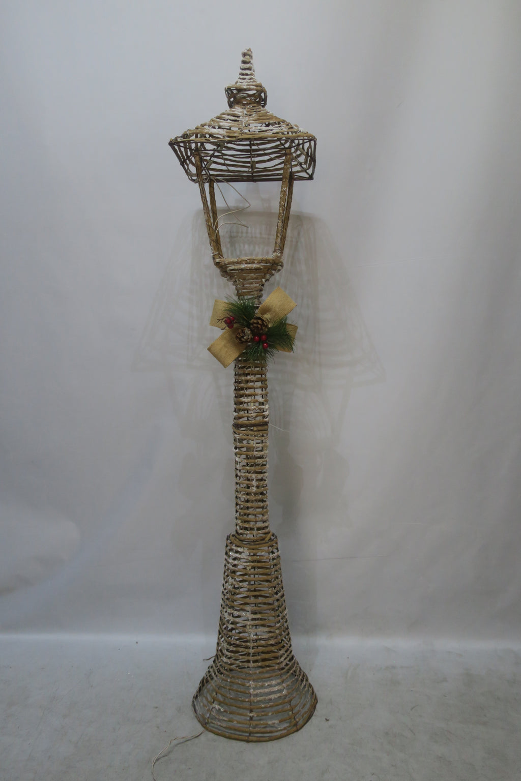 60-inch wicker-style street lamp light with 100 warm LEDs.