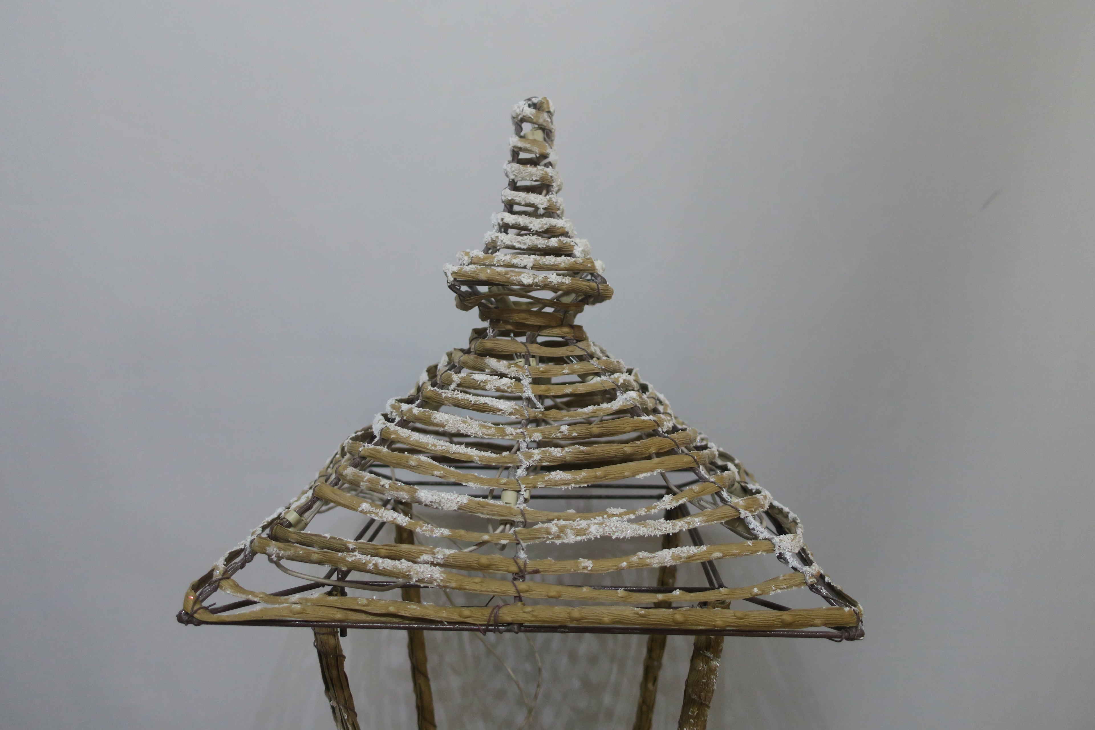 60-inch wicker-style street lamp light with 100 warm LEDs.