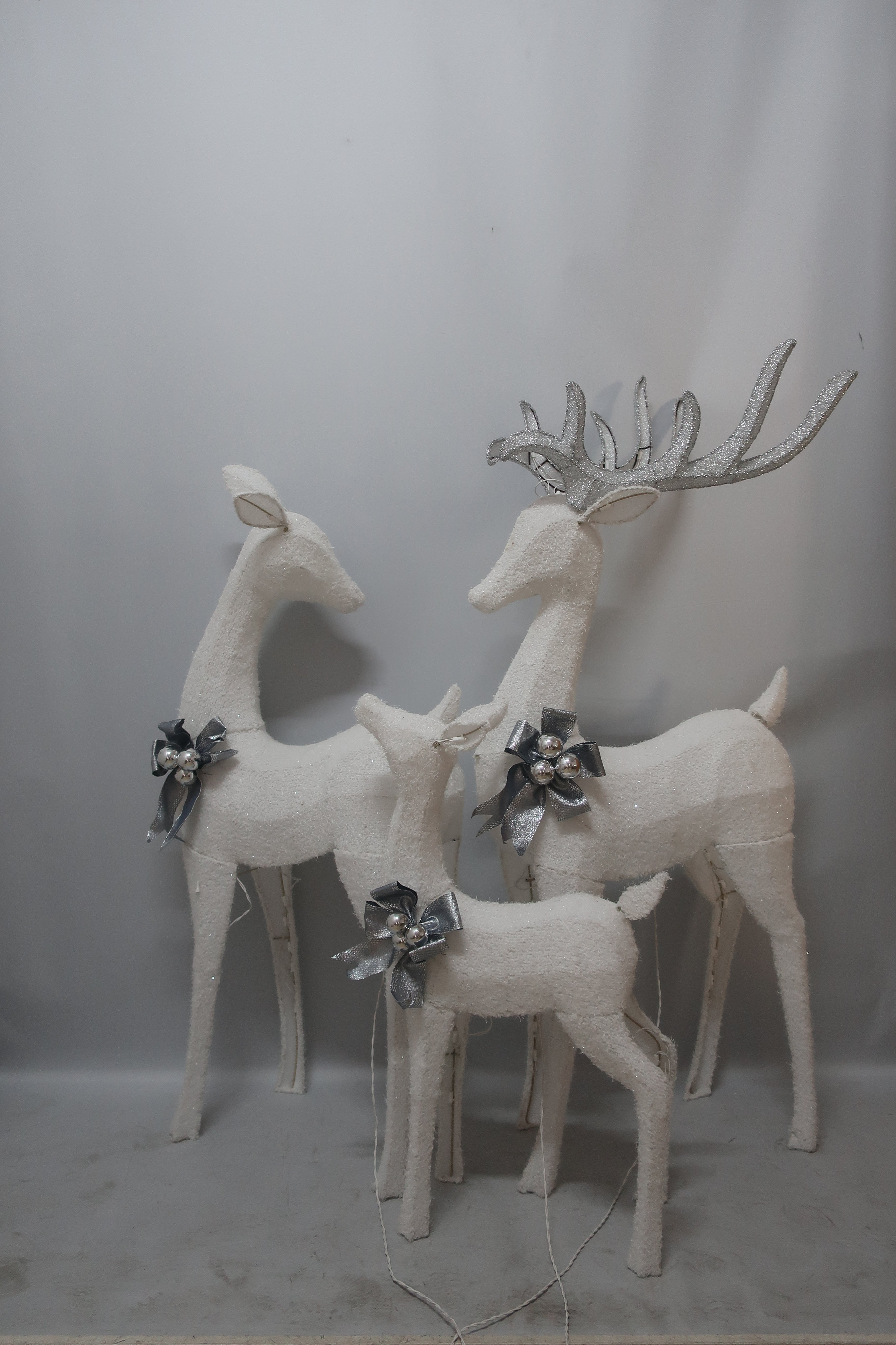 Set of 3 Lighted Reindeer (60/52/36") with 140+105+70 LEDs.