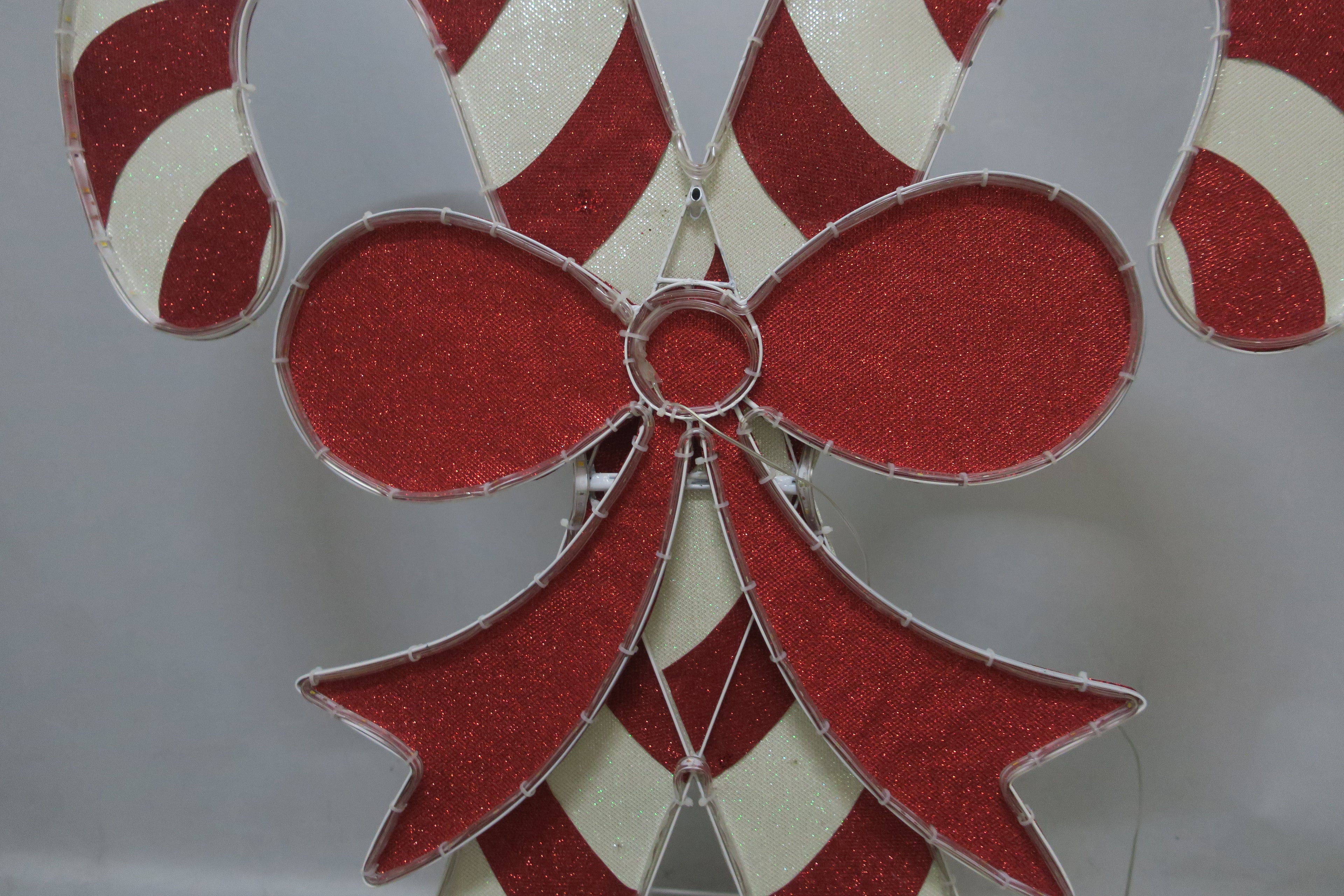 36-inch 105-light fabric-wrapped tube light bow double cane decoration
